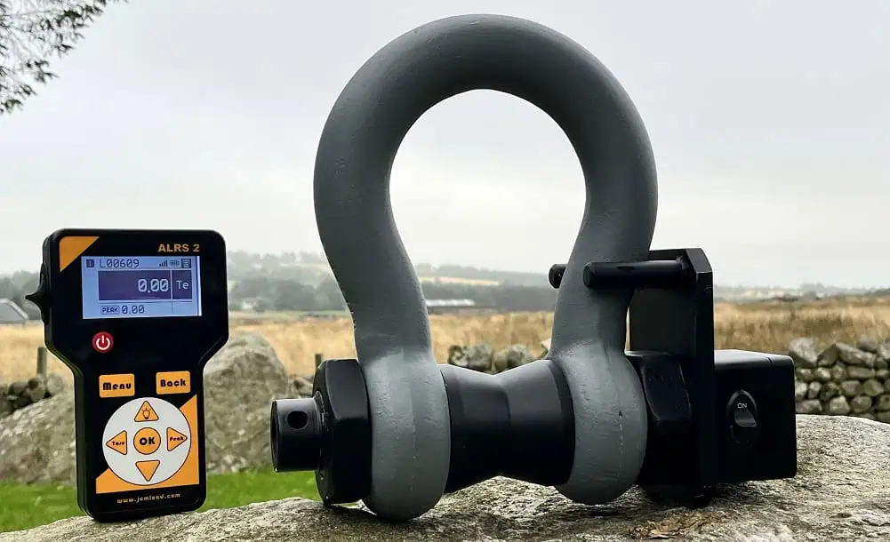 Digital load shackle displayed on stone surface