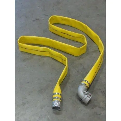 Yellow fire hose on concrete floor