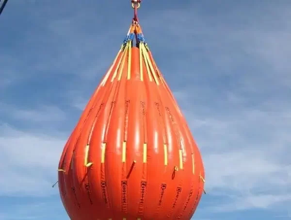 Large inflatable crane test water bag suspended in air