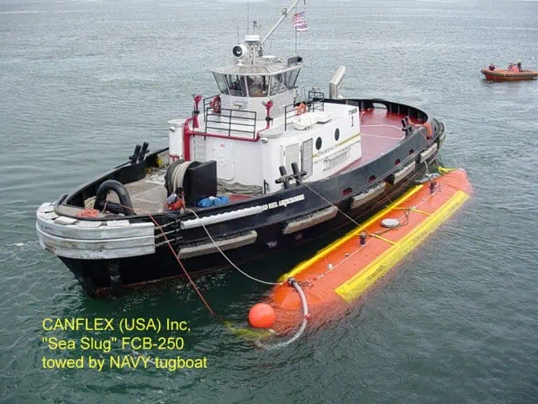 Navy tugboat towing Sea Slug FCB-250