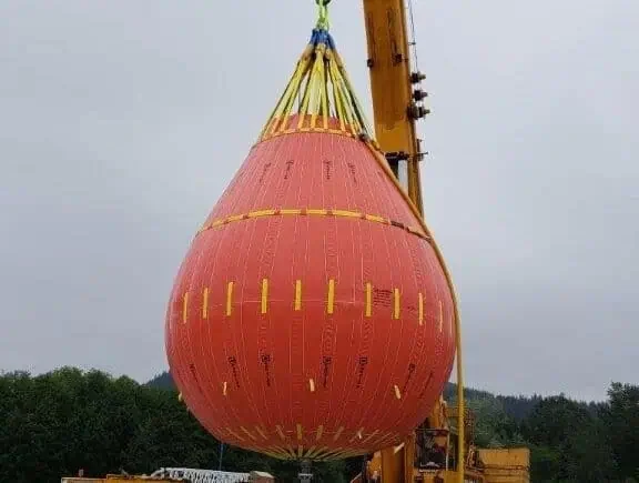 Crane lifting large crane test water bag