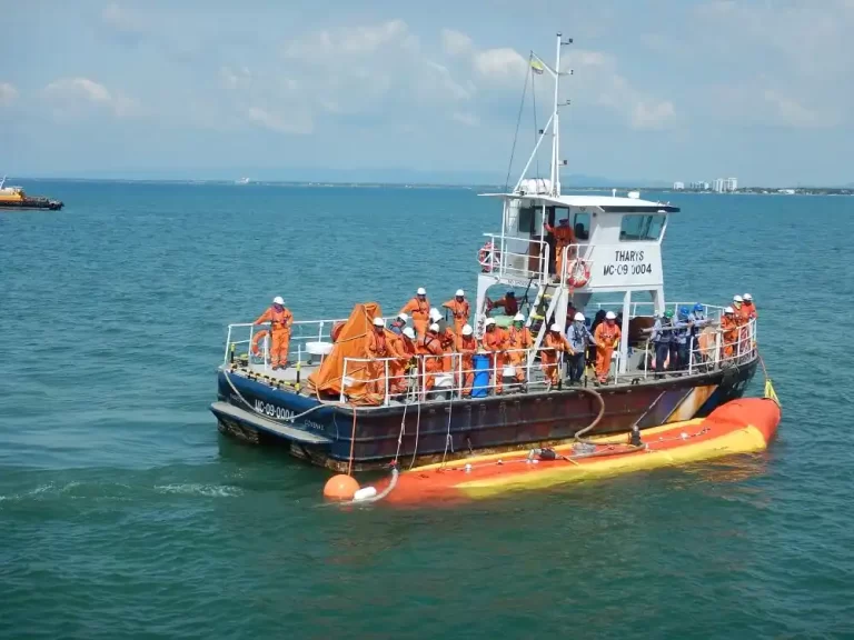 Crew on boat performing marine rescue drill