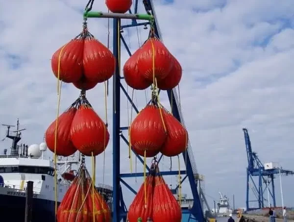 Large crane test water bags on crane at the harbor.