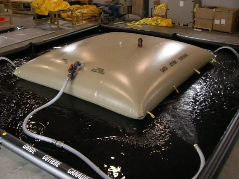 Inflatable water bladder in containment area