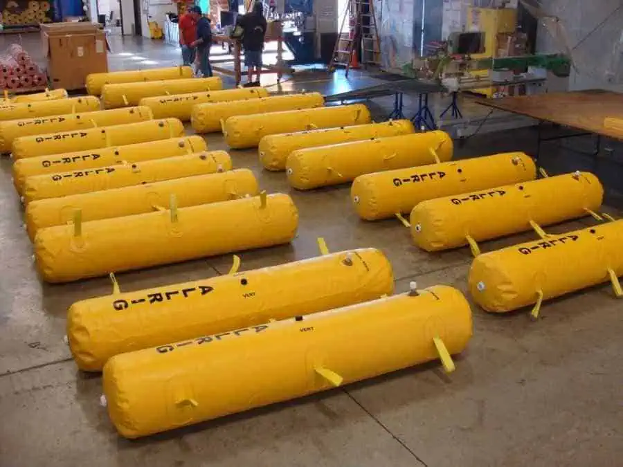 Yellow inflatable air lifting bags in workshop