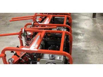 Row of industrial generators in a warehouse