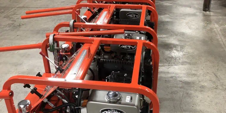 Row of industrial generators in a warehouse