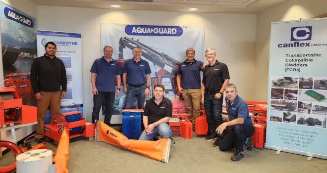 Team displaying Aqua-Guard and Canflex equipment