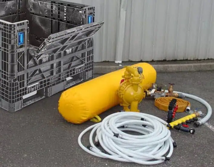 Industrial hoses and equipment with storage container
