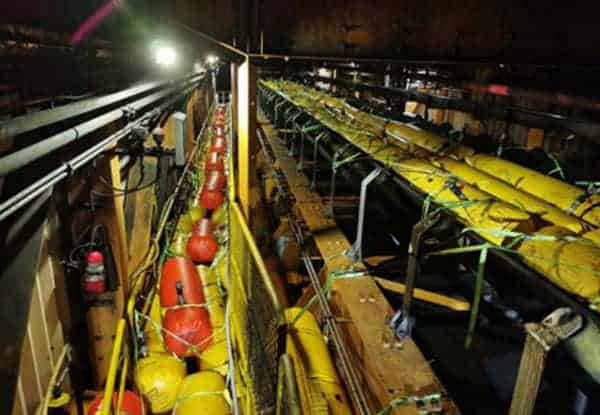 Smuggling tunnel filled with yellow gas tanks