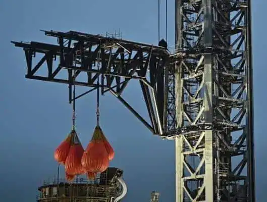 Launch tower lifting heavy test weights