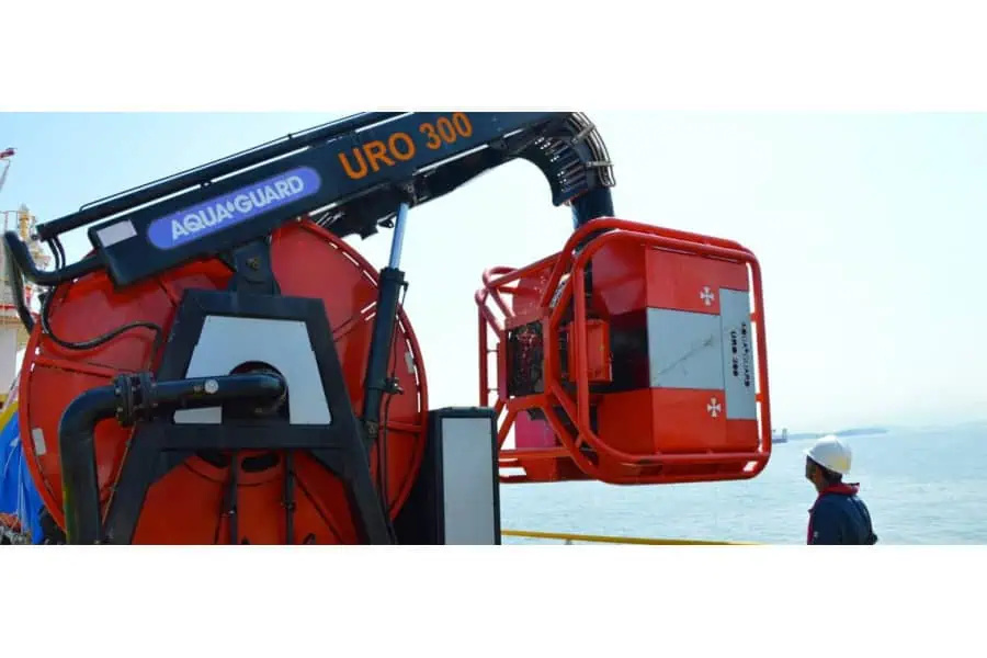 Worker operating Aquaguard URO 300 near water