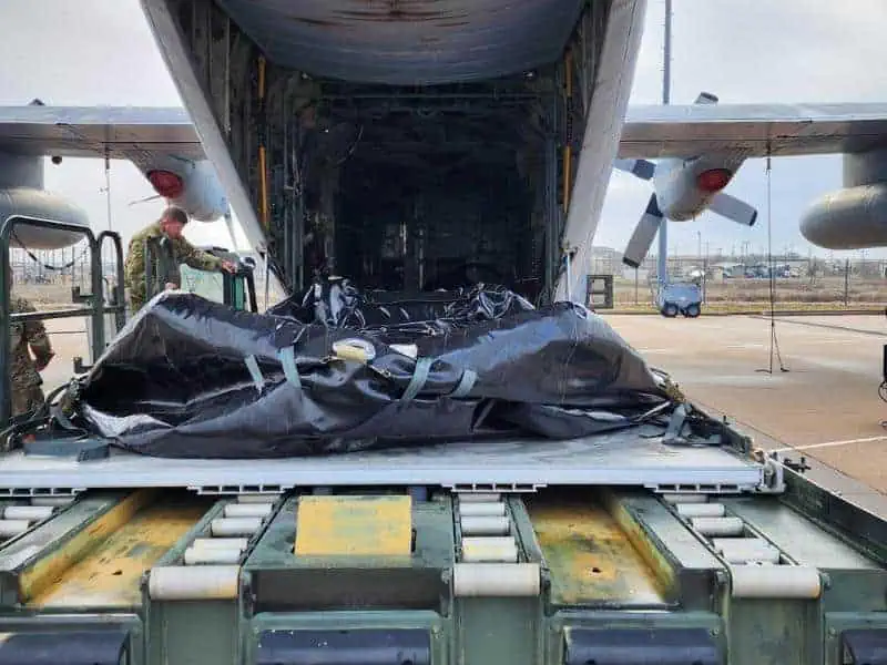 Military cargo loaded into transport aircraft