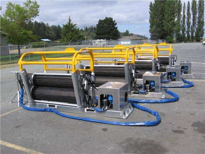 Industrial hose reel systems in outdoor parking area