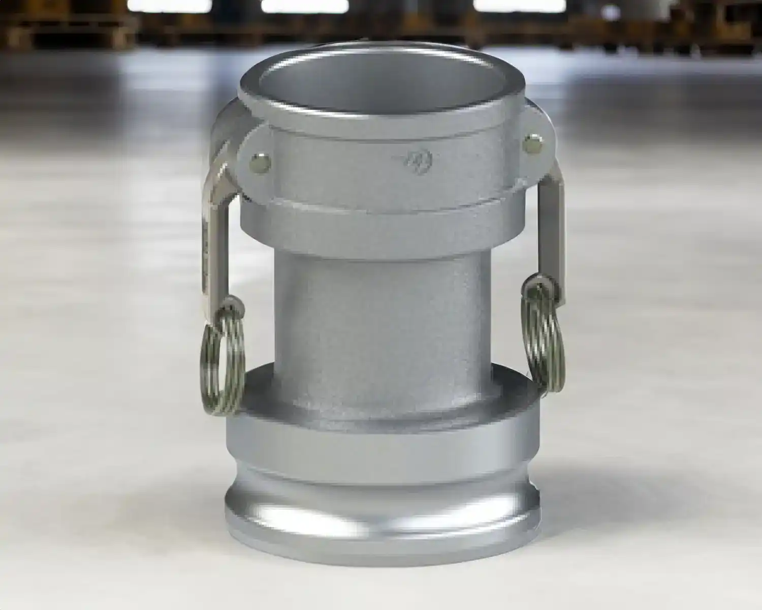 Aluminum camlock coupling on warehouse floor