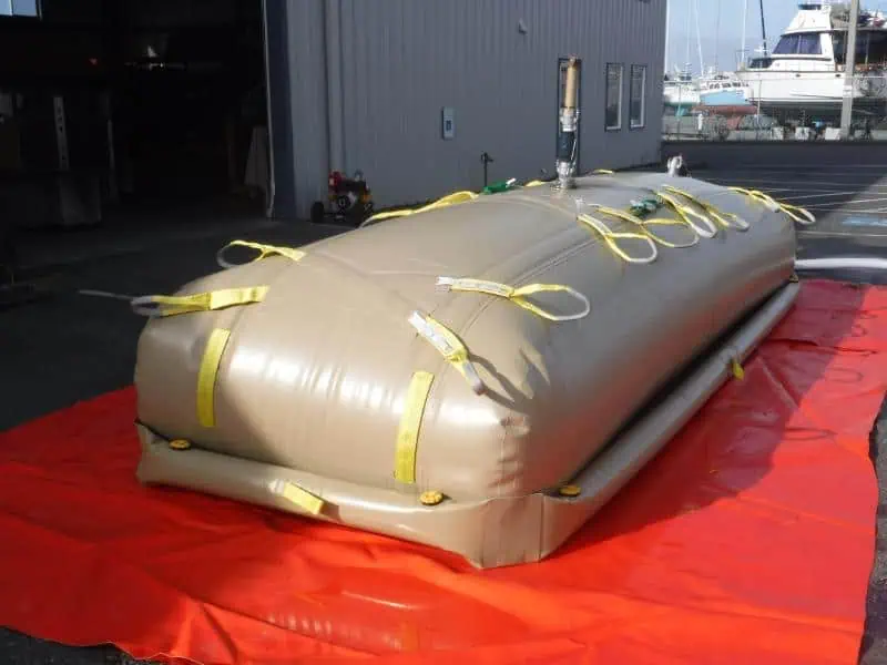 Large flexible water storage tank outdoors