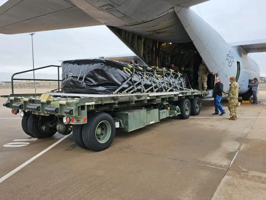 Cargo being loaded into military transport aircraft