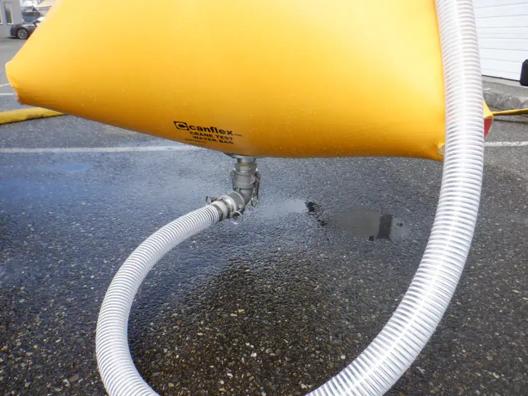 Yellow water weight bag with hose connection