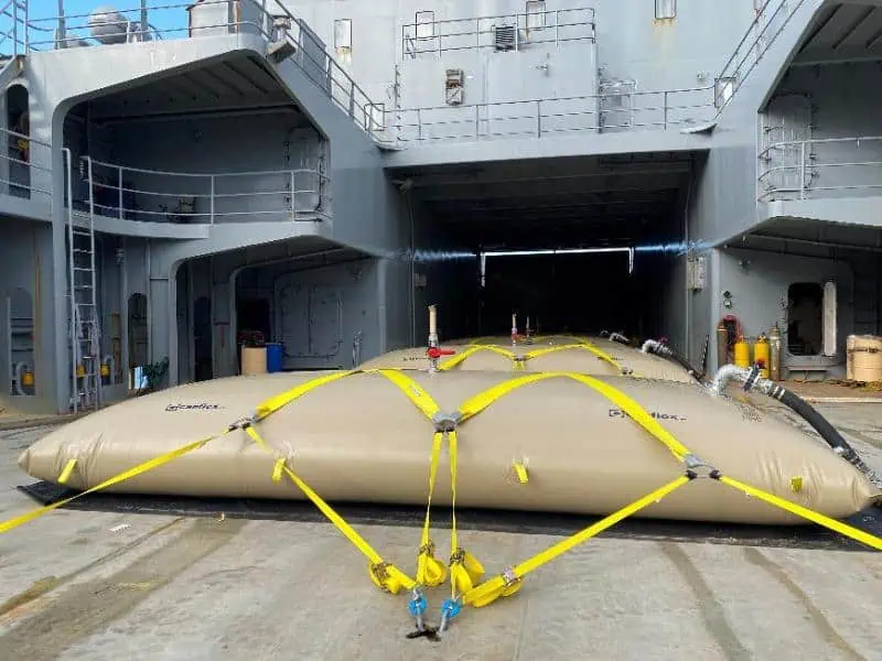 Large flexible water storage tank on ship deck