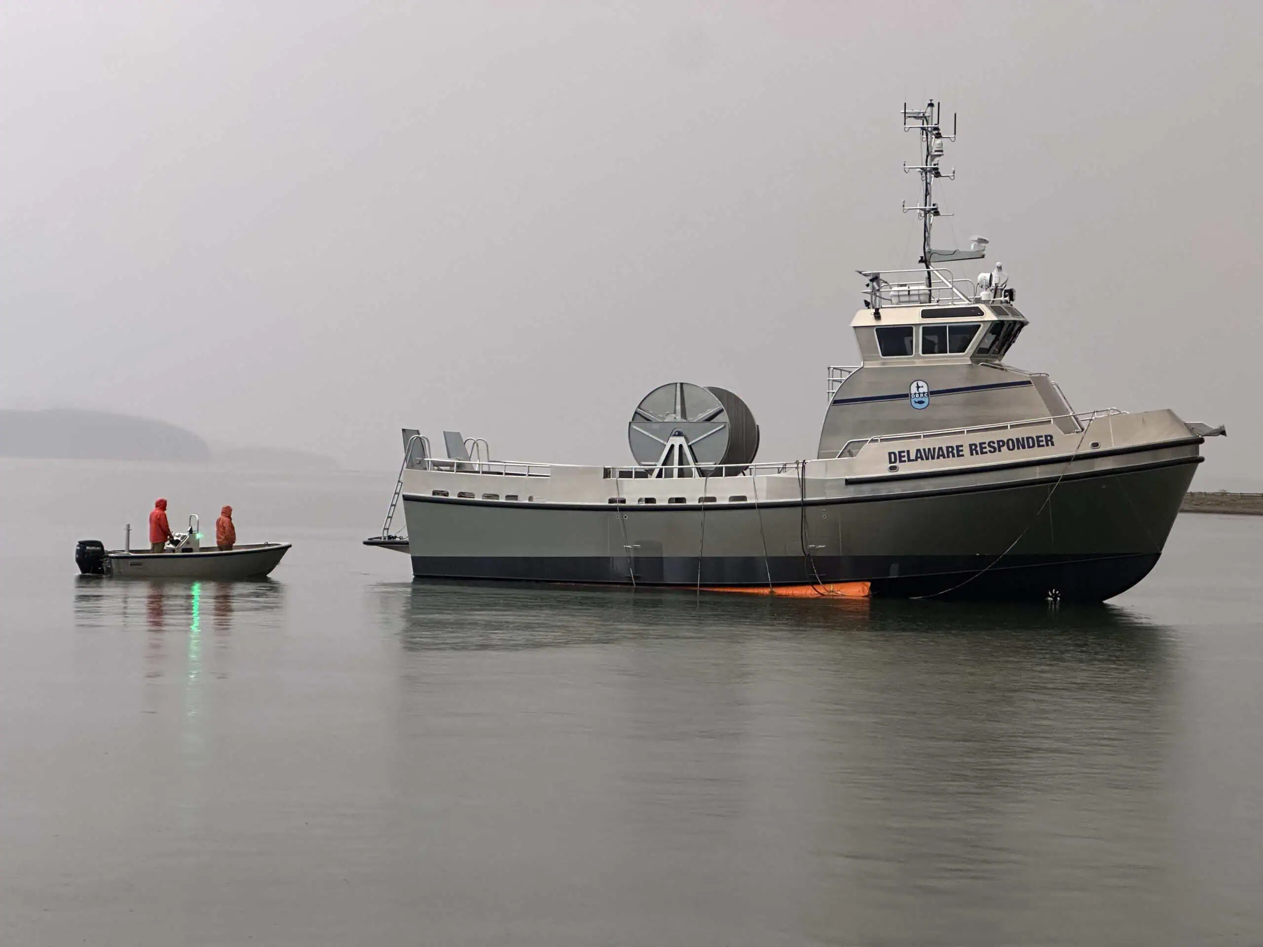 Delaware Responder vessel with small boat nearby